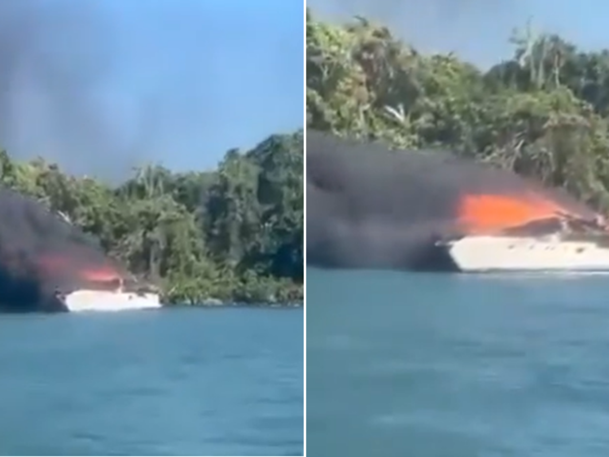 Iate com 18 pessoas pega fogo próximo à praia do Iporanga, em Guarujá