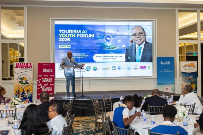 Minister of Tourism addresses Tourism Action Club members at the Tourism Awareness Week AI Youth Forum at Sandals Dunns River.